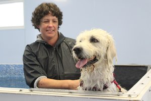 Gemma Whiston Hydrotherapist with big dog